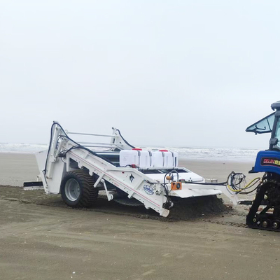 Trattore di spazzatura di spiaggia di pulizia alcalina trainato per setacciare detriti di sabbia secca o umida